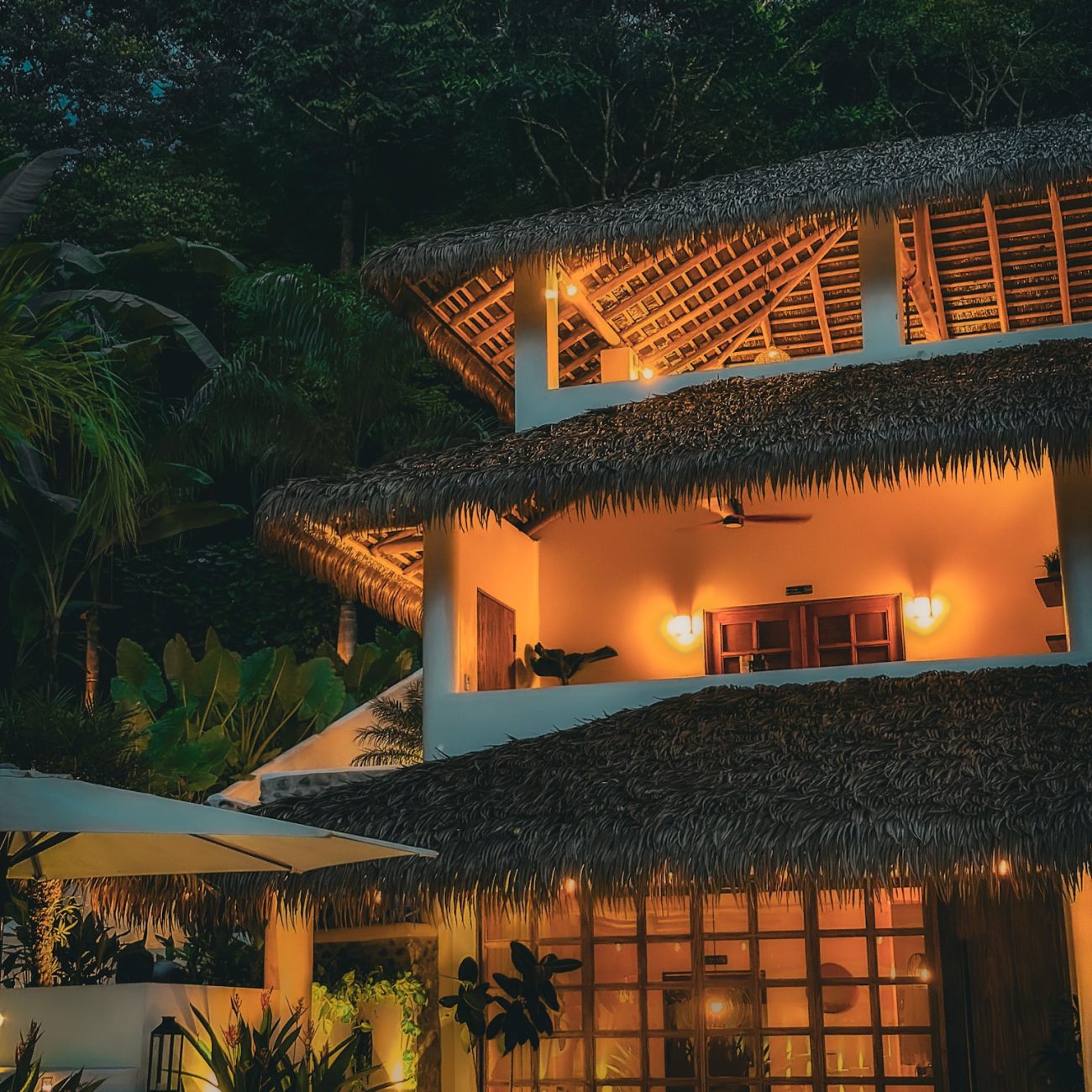 Beautiful adults only boutique hotel in Uvita Costa Rica highlighting its lighting at dusk
