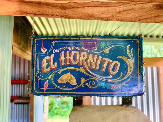 Colorful sign of El Hornito, an Argentinian restaurant in Uvita, Costa Rica.