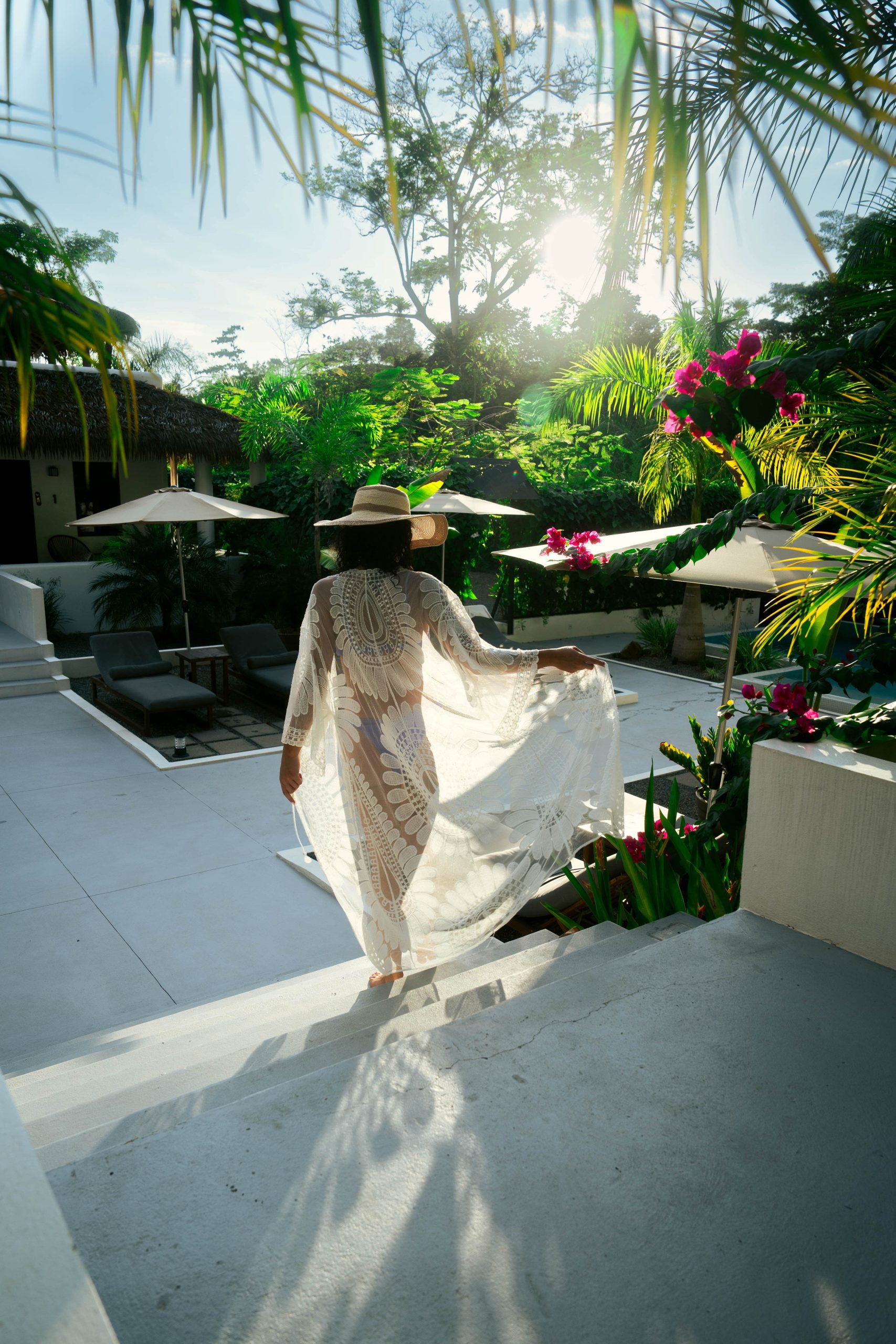 Woman walking through a beautiful boutique hotel in Uvita Costa Rica
