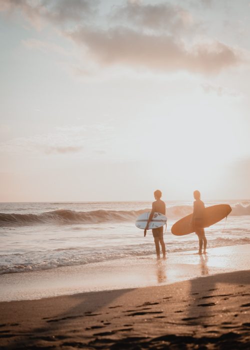 Surfers on beach Costa Rica